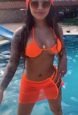 5. Sultry Anyuri Lozano Shows Cleavage in Electric Orange Bikini Top at the Swimming Pool (Underboob)