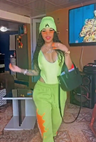 Sultry Anyuri Lozano Shows Cleavage in Lime Green Swimsuit