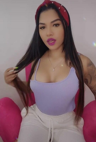 Sexy Anyuri Lozano Shows Cleavage in Purple Top