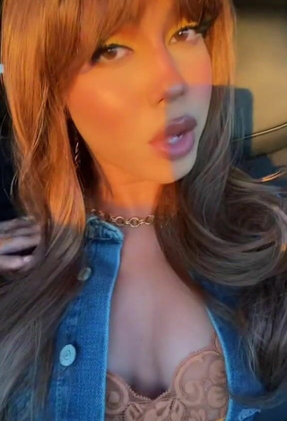 2. Erotic Asia Monet Ray Shows Cleavage in a Car