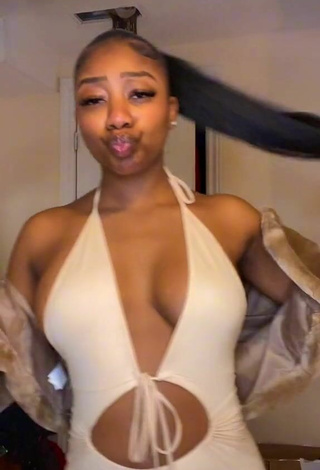 Cute Benita Jadah Shows Cleavage and Bouncing Tits