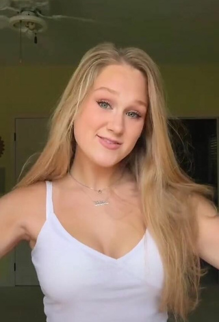 3. Luscious Caiti Mackenzie Shows Cleavage in White Crop Top