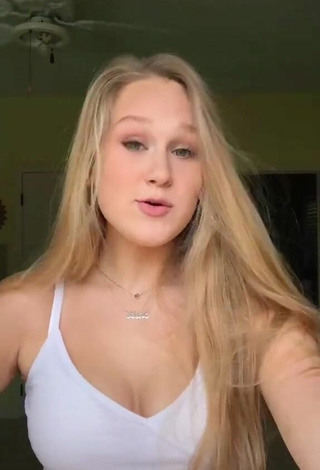 5. Luscious Caiti Mackenzie Shows Cleavage in White Crop Top