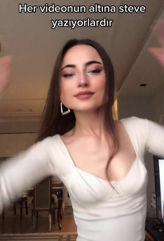 Cute Ceylan Shows Cleavage in White Crop Top