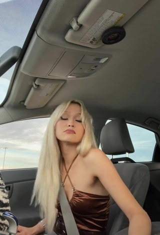 5. Sultry Isabella Sosa in Dress in a Car