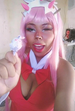 Sultry Dezza.cosplay Shows Cleavage in Pink Bodysuit