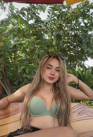 4. Luscious Eaaayyy Shows Cleavage in Olive Bikini Top