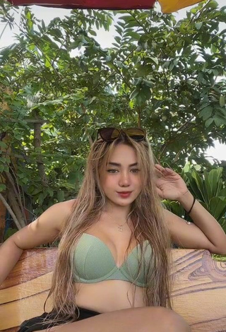 6. Luscious Eaaayyy Shows Cleavage in Olive Bikini Top