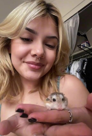 3. Sultry Eggthehamsterr Shows Cleavage in Grey Top