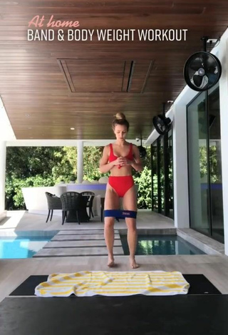 Sultry Elle Leonard in Red Bikini while doing Fitness Exercises