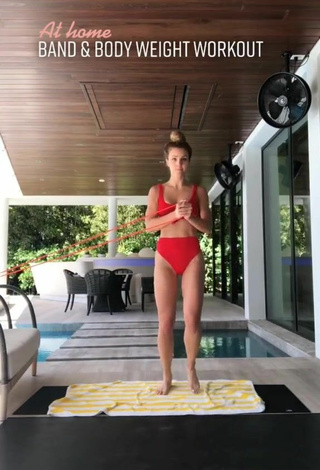 6. Sultry Elle Leonard in Red Bikini while doing Fitness Exercises