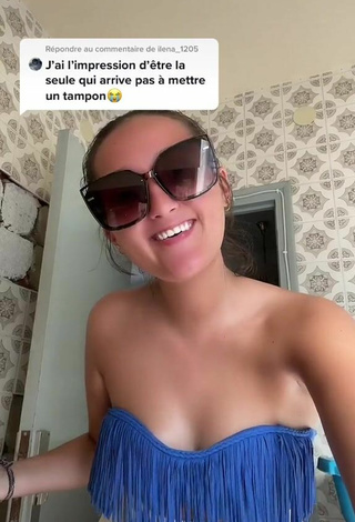 Sultry Eva Cstt Shows Cleavage in Blue Bikini Top