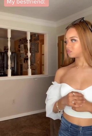 5. Luscious Faith Thigpen Shows Cleavage in White Crop Top