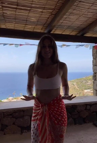 Sultry Gaia in White Crop Top on the Balcony