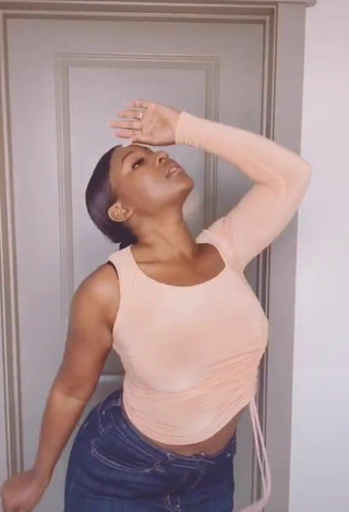 3. Sweet Airionna Lynch in Cute Peach Crop Top