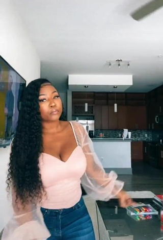 Luscious Airionna Lynch Shows Cleavage in Pink Top and Bouncing Tits