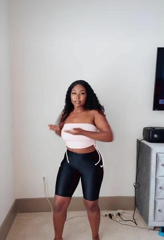 2. Sultry Airionna Lynch in White Crop Top