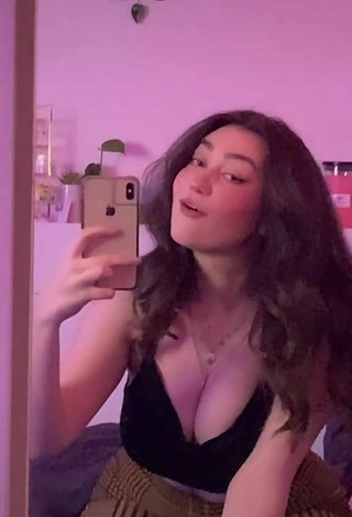 5. Sultry Simone Shows Cleavage in Black Crop Top