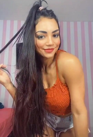 2. Beautiful Ingrid Muniz in Sexy Orange Crop Top