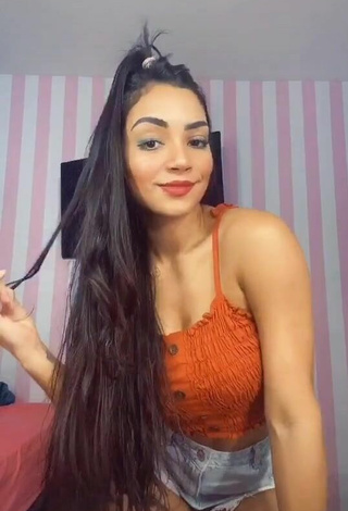 4. Beautiful Ingrid Muniz in Sexy Orange Crop Top