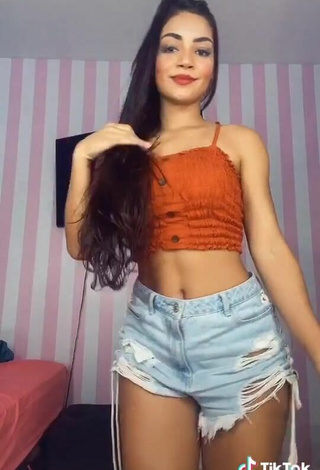 5. Beautiful Ingrid Muniz in Sexy Orange Crop Top