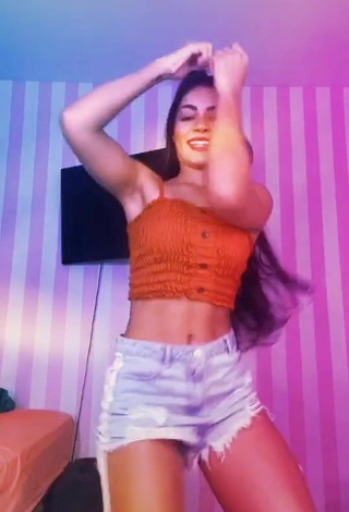 6. Beautiful Ingrid Muniz in Sexy Orange Crop Top