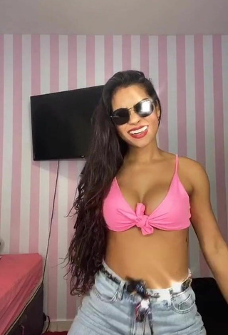 3. Erotic Ingrid Muniz Shows Cleavage in Pink Bikini Top