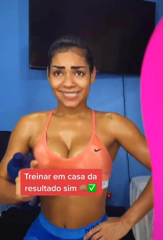 Hottest Ingrid Muniz Shows Cleavage in Orange Sport Bra while doing Fitness Exercises