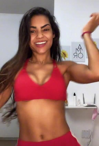 Hot Ingrid Muniz Shows Cleavage in Red Sport Bra