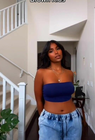 Sultry Ishini W Shows Cleavage in Blue Tube Top