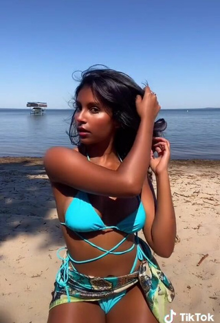 6. Sultry Ishini W Shows Cleavage in Blue Bikini at the Beach