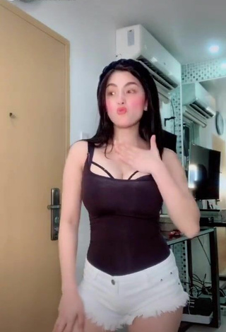 Hot Karen Anne Tuazon Shows Cleavage in Brown Top