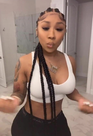 Sexy Ariana Fletcher Shows Cleavage in White Crop Top