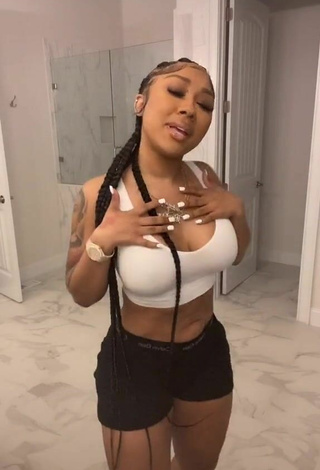 Cute Ariana Fletcher Shows Cleavage in White Crop Top