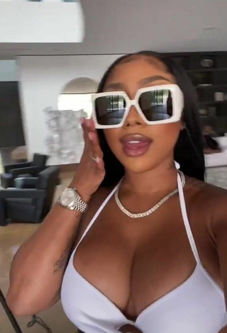 Sultry Ariana Fletcher Shows Cleavage in White Bikini Top