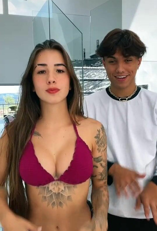 Sultry Julieta Shows Cleavage in Red Bikini Top