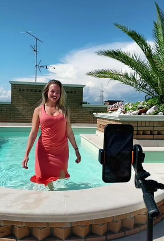 3. Sultry lalequita in Red Dress at the Swimming Pool