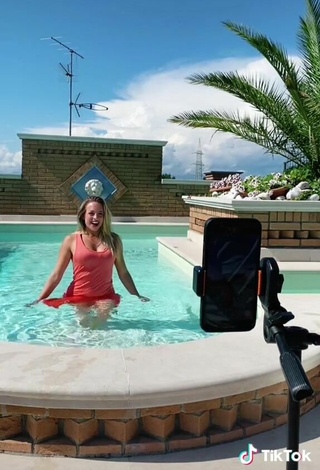 5. Sultry lalequita in Red Dress at the Swimming Pool