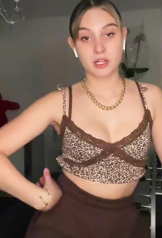 4. Sultry Loane Shows Cleavage in Leopard Crop Top