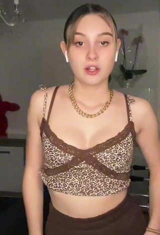 6. Sultry Loane Shows Cleavage in Leopard Crop Top