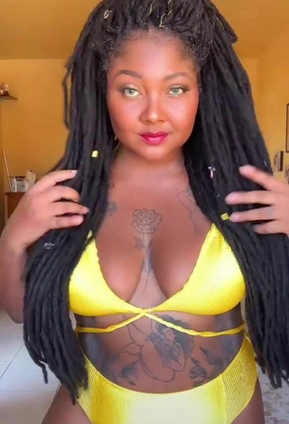 3. Luscious Manu Mendes Shows Cleavage in Yellow Bikini