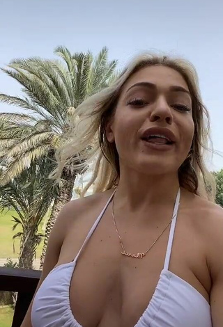 Titillating Maria Shows Cleavage in White Bikini Top