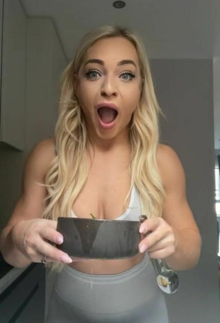 6. Cute Maria Shows Cleavage in Grey Crop Top