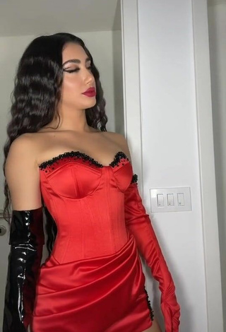 2. Sultry Melinda Ademi in Red Corset