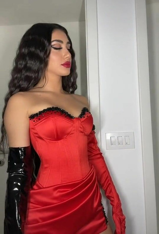 3. Sultry Melinda Ademi in Red Corset