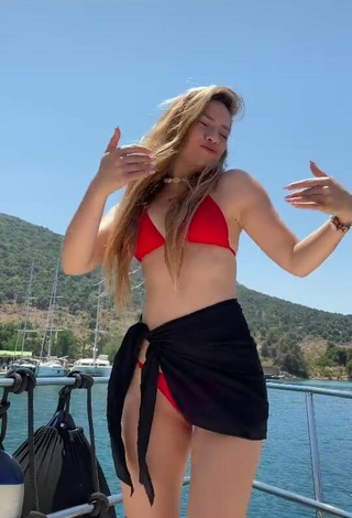 Cute Melodi Özerdem in Red Bikini in the Sea