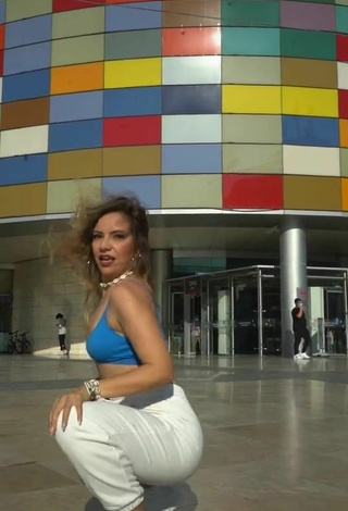 4. Sultry Melodi Özerdem in Blue Sport Bra in a Street