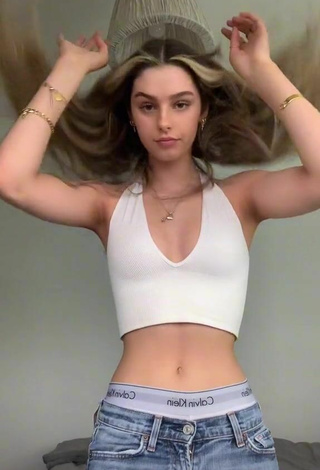 6. Sultry Millie Leer Shows Cleavage in White Crop Top