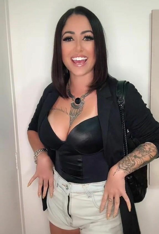 3. Sexy Naiara Coelho Shows Cleavage in Black Top