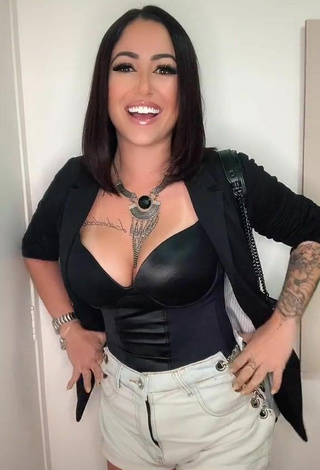 4. Sexy Naiara Coelho Shows Cleavage in Black Top